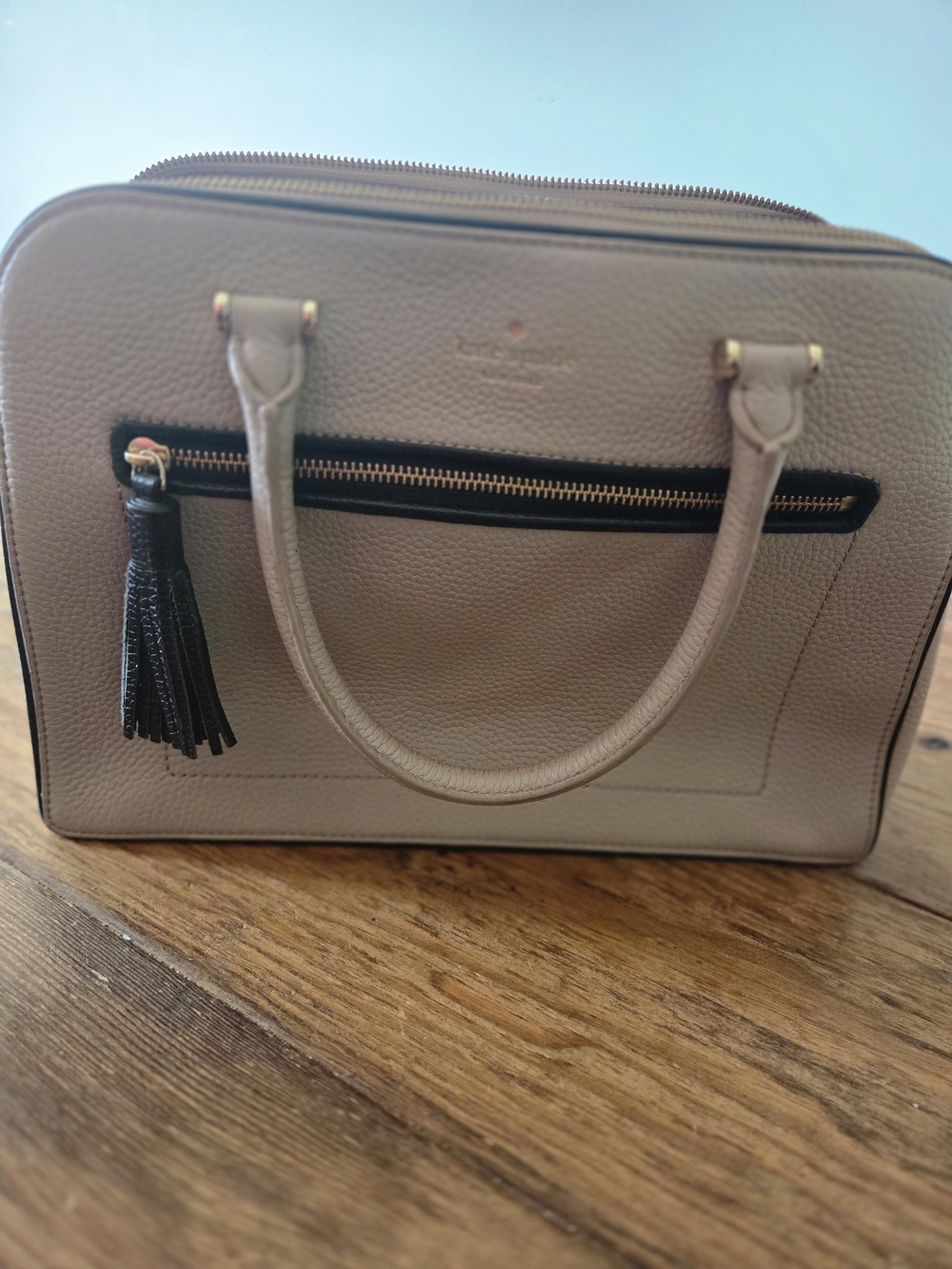 Kate Spade New York Chester Street satchel. Crafted from durable, high